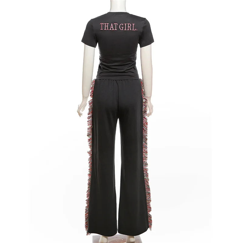 Elegant two-piece outfit featuring fringe detailing, perfect for stylish and sophisticated fashion statements.