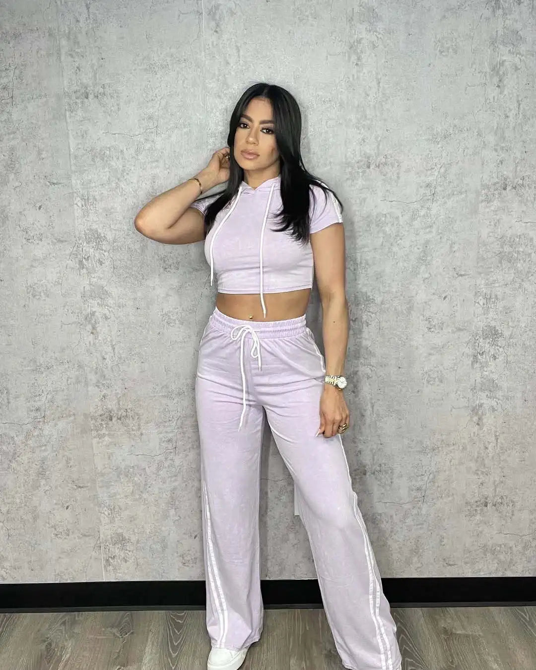 Cute and Comfy Two-Piece Stripe Crop Top and Pants Set.