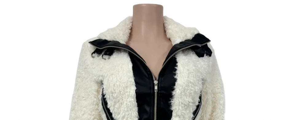 White sherpa jacket with black accents on a mannequin against a white background