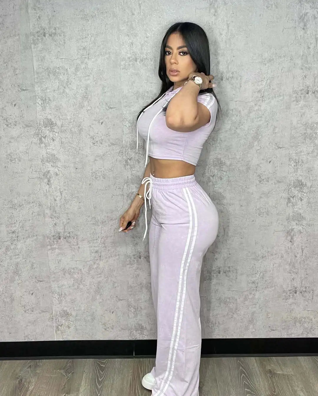 Cute and Comfy Two-Piece Stripe Crop Top and Pants Set.